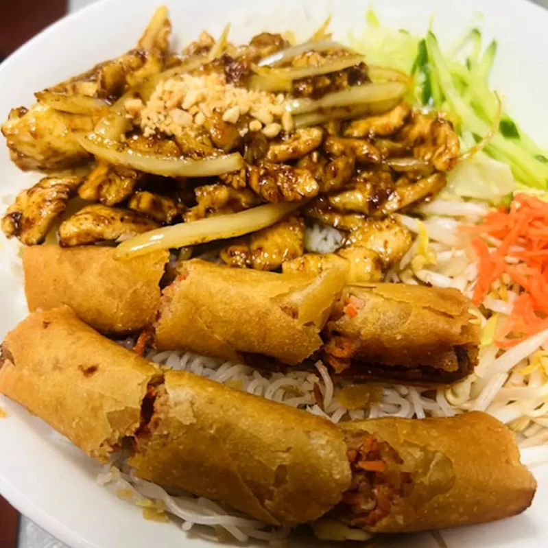 Stir-Fried Lemongrass Chicken and Spring Rolls on rice vermicelli at Saigon Sun Okotoks